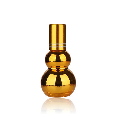 Bouteilles à rouleaux de luxe en forme de citrouille métallique en forme de gourde d'or UV huile essentielle bouteilles à rouleaux vides 50 ml 100 ml